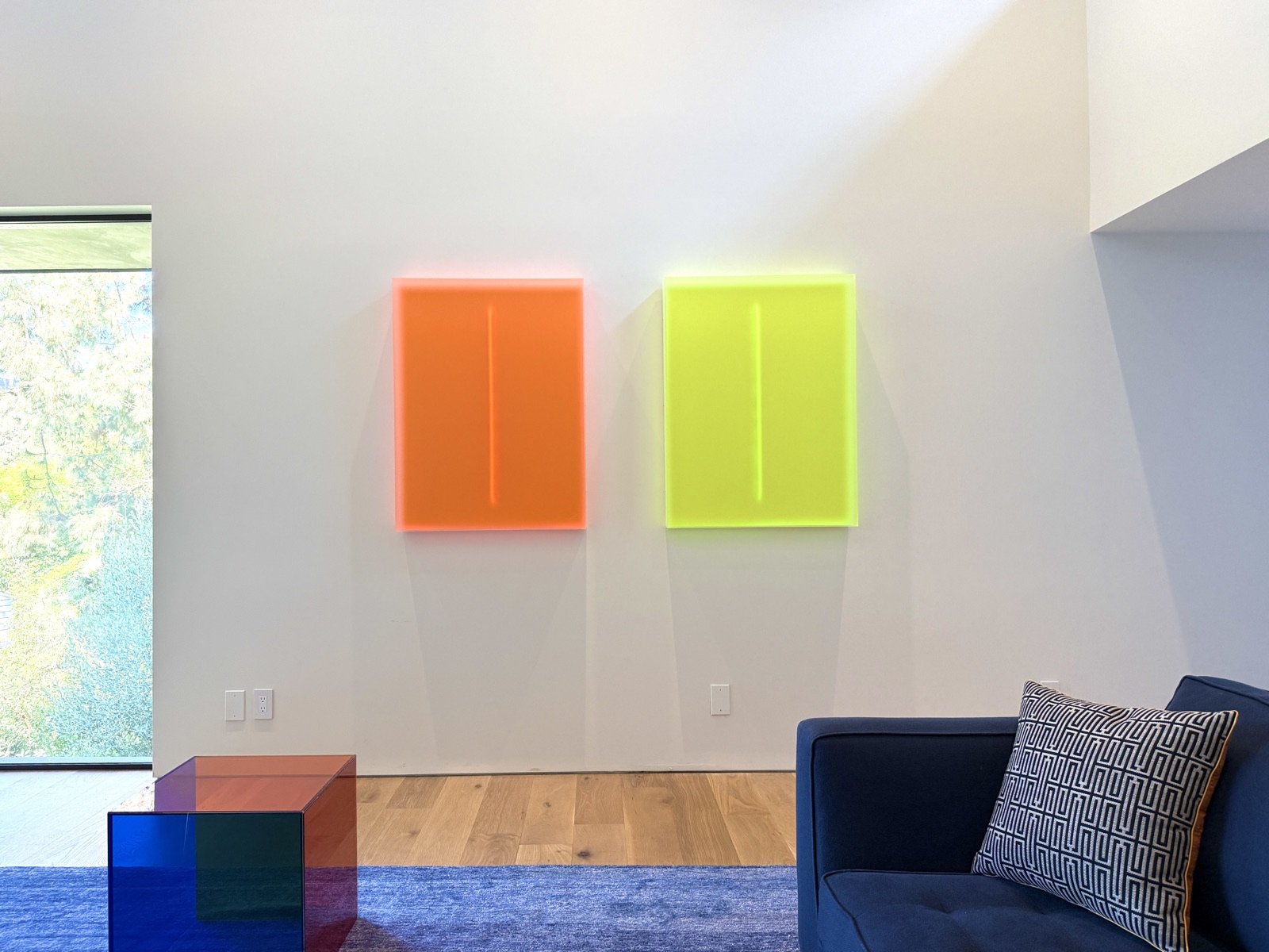Two wall-mounted Light Forms in full daylight