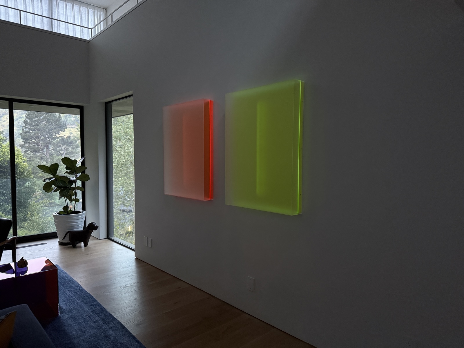 The same two Light Forms glowing in low evening light